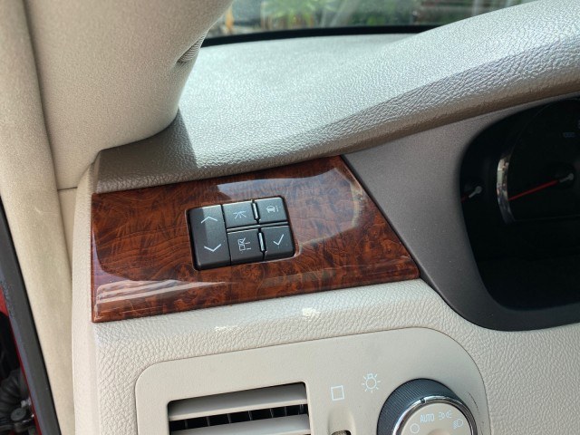 2006 Crimson Pearl /Shale Cadillac DTS w/1SC LOW MILES 49863 SUNROOF PEARL RED (1G6KD57Y26U) with an 4.6L DOHC V8 Northstar Engine engine, Automatic transmission, located at 4701 North Dixie Hwy, Pompano Beach, FL, 33064, (954) 422-2889, 26.240938, -80.123474 - OUR WEBPAGE FLORIDACARS1.COM HAS OVER 100 PHOTOS AND FREE CARFAX LINK 2006 Cadillac DTS Luxury Sedan 4 DR 4.6L V8 F Gasoline 25 MPG Front Wheel Drive Features A/C Seat(s) ABS Brakes Air Conditioning Alloy Wheels AM/FM Stereo Automatic Transmission Auxiliary Audio Input Bluetooth Technology CD Audio- Photo#55