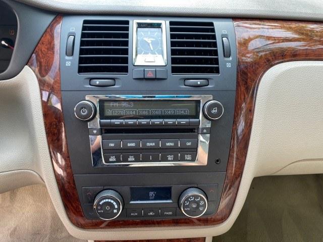 2006 Crimson Pearl /Shale Cadillac DTS w/1SC LOW MILES 49863 SUNROOF PEARL RED (1G6KD57Y26U) with an 4.6L DOHC V8 Northstar Engine engine, Automatic transmission, located at 4701 North Dixie Hwy, Pompano Beach, FL, 33064, (954) 422-2889, 26.240938, -80.123474 - OUR WEBPAGE FLORIDACARS1.COM HAS OVER 100 PHOTOS AND FREE CARFAX LINK 2006 Cadillac DTS Luxury Sedan 4 DR 4.6L V8 F Gasoline 25 MPG Front Wheel Drive Features A/C Seat(s) ABS Brakes Air Conditioning Alloy Wheels AM/FM Stereo Automatic Transmission Auxiliary Audio Input Bluetooth Technology CD Audio- Photo#57