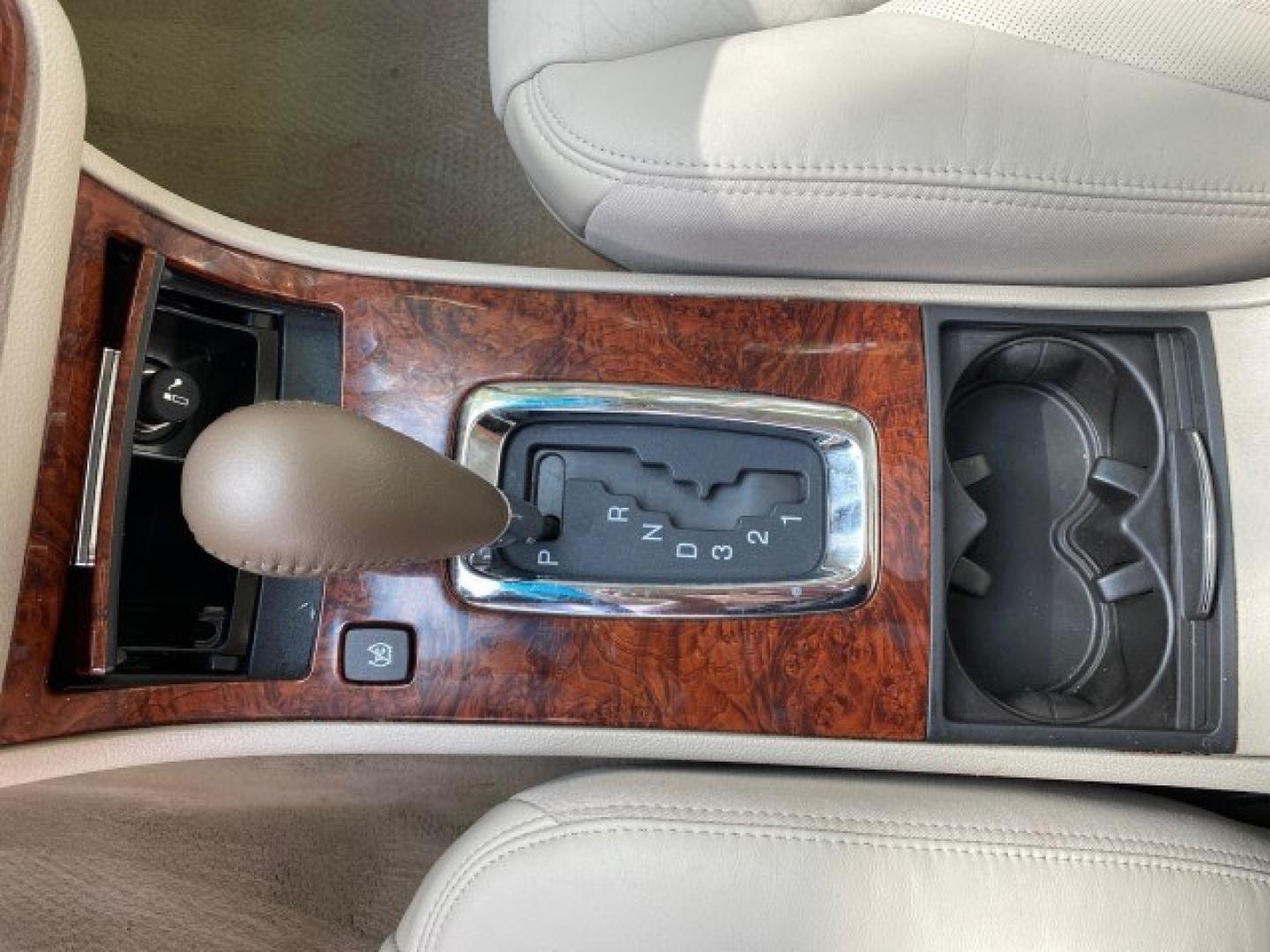 2006 Crimson Pearl /Shale Cadillac DTS w/1SC LOW MILES 49863 SUNROOF PEARL RED (1G6KD57Y26U) with an 4.6L DOHC V8 Northstar Engine engine, Automatic transmission, located at 4701 North Dixie Hwy, Pompano Beach, FL, 33064, (954) 422-2889, 26.240938, -80.123474 - OUR WEBPAGE FLORIDACARS1.COM HAS OVER 100 PHOTOS AND FREE CARFAX LINK 2006 Cadillac DTS Luxury Sedan 4 DR 4.6L V8 F Gasoline 25 MPG Front Wheel Drive Features A/C Seat(s) ABS Brakes Air Conditioning Alloy Wheels AM/FM Stereo Automatic Transmission Auxiliary Audio Input Bluetooth Technology CD Audio- Photo#61