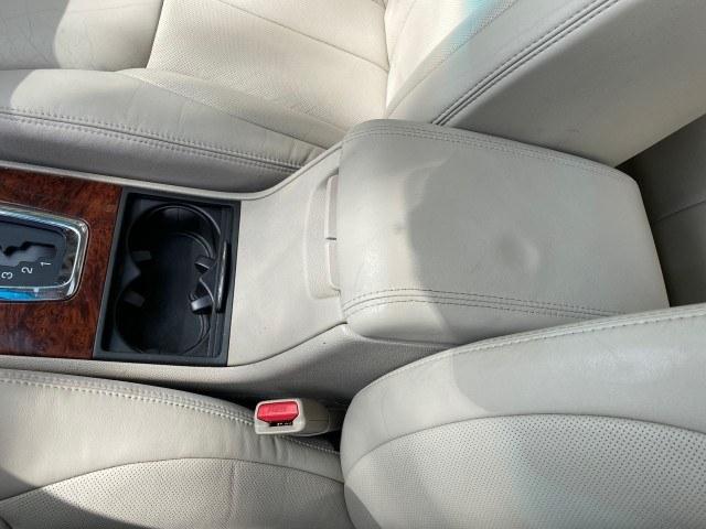 2006 Crimson Pearl /Shale Cadillac DTS w/1SC LOW MILES 49863 SUNROOF PEARL RED (1G6KD57Y26U) with an 4.6L DOHC V8 Northstar Engine engine, Automatic transmission, located at 4701 North Dixie Hwy, Pompano Beach, FL, 33064, (954) 422-2889, 26.240938, -80.123474 - OUR WEBPAGE FLORIDACARS1.COM HAS OVER 100 PHOTOS AND FREE CARFAX LINK 2006 Cadillac DTS Luxury Sedan 4 DR 4.6L V8 F Gasoline 25 MPG Front Wheel Drive Features A/C Seat(s) ABS Brakes Air Conditioning Alloy Wheels AM/FM Stereo Automatic Transmission Auxiliary Audio Input Bluetooth Technology CD Audio- Photo#62