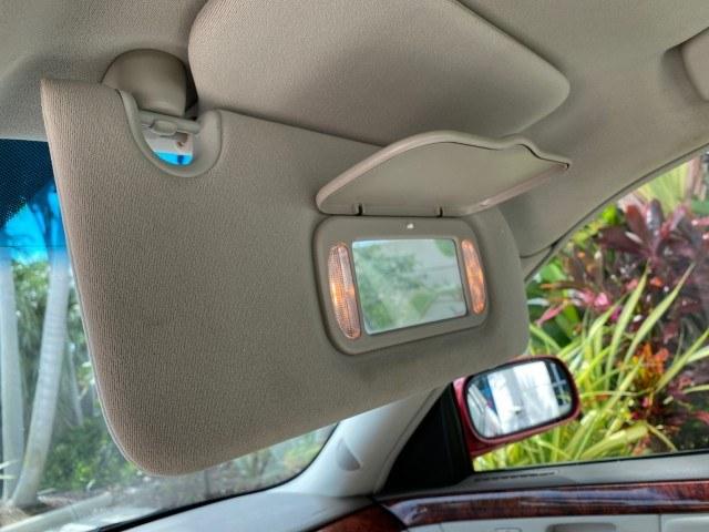 2006 Crimson Pearl /Shale Cadillac DTS w/1SC LOW MILES 49863 SUNROOF PEARL RED (1G6KD57Y26U) with an 4.6L DOHC V8 Northstar Engine engine, Automatic transmission, located at 4701 North Dixie Hwy, Pompano Beach, FL, 33064, (954) 422-2889, 26.240938, -80.123474 - OUR WEBPAGE FLORIDACARS1.COM HAS OVER 100 PHOTOS AND FREE CARFAX LINK 2006 Cadillac DTS Luxury Sedan 4 DR 4.6L V8 F Gasoline 25 MPG Front Wheel Drive Features A/C Seat(s) ABS Brakes Air Conditioning Alloy Wheels AM/FM Stereo Automatic Transmission Auxiliary Audio Input Bluetooth Technology CD Audio- Photo#71