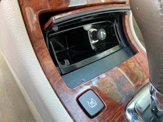 2006 Crimson Pearl /Shale Cadillac DTS w/1SC LOW MILES 49863 SUNROOF PEARL RED (1G6KD57Y26U) with an 4.6L DOHC V8 Northstar Engine engine, Automatic transmission, located at 4701 North Dixie Hwy, Pompano Beach, FL, 33064, (954) 422-2889, 26.240938, -80.123474 - OUR WEBPAGE FLORIDACARS1.COM HAS OVER 100 PHOTOS AND FREE CARFAX LINK 2006 Cadillac DTS Luxury Sedan 4 DR 4.6L V8 F Gasoline 25 MPG Front Wheel Drive Features A/C Seat(s) ABS Brakes Air Conditioning Alloy Wheels AM/FM Stereo Automatic Transmission Auxiliary Audio Input Bluetooth Technology CD Audio- Photo#75