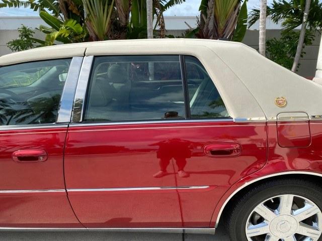 2006 Crimson Pearl /Shale Cadillac DTS w/1SC LOW MILES 49863 SUNROOF PEARL RED (1G6KD57Y26U) with an 4.6L DOHC V8 Northstar Engine engine, Automatic transmission, located at 4701 North Dixie Hwy, Pompano Beach, FL, 33064, (954) 422-2889, 26.240938, -80.123474 - OUR WEBPAGE FLORIDACARS1.COM HAS OVER 100 PHOTOS AND FREE CARFAX LINK 2006 Cadillac DTS Luxury Sedan 4 DR 4.6L V8 F Gasoline 25 MPG Front Wheel Drive Features A/C Seat(s) ABS Brakes Air Conditioning Alloy Wheels AM/FM Stereo Automatic Transmission Auxiliary Audio Input Bluetooth Technology CD Audio- Photo#79