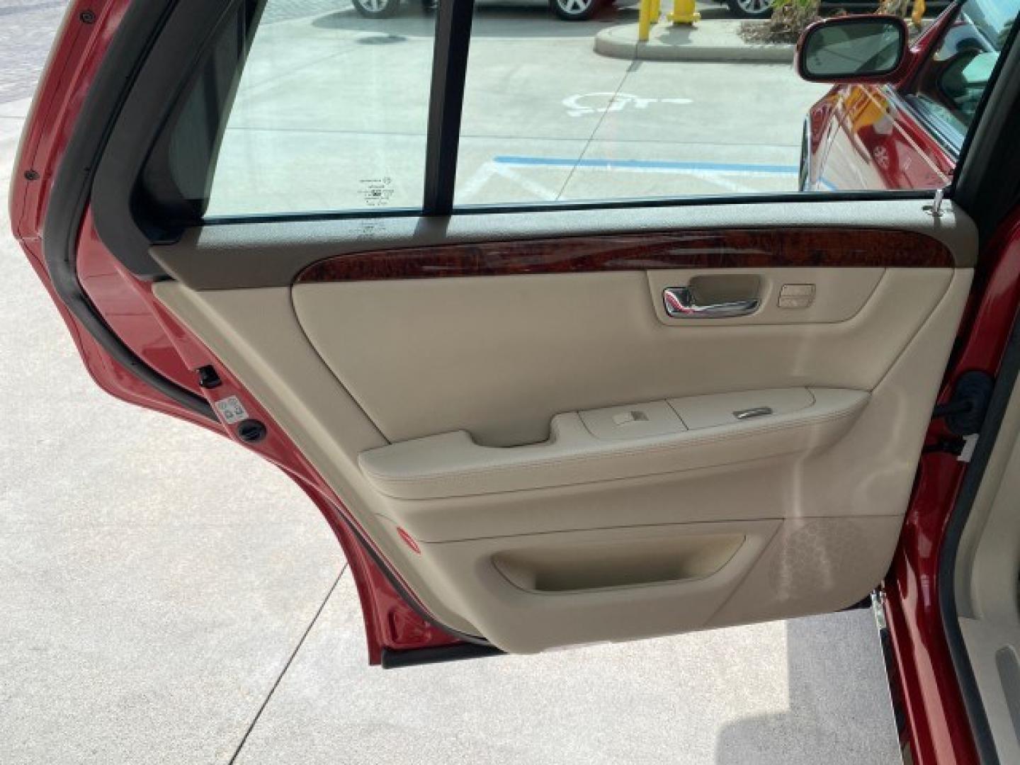 2006 Crimson Pearl /Shale Cadillac DTS w/1SC LOW MILES 49863 SUNROOF PEARL RED (1G6KD57Y26U) with an 4.6L DOHC V8 Northstar Engine engine, Automatic transmission, located at 4701 North Dixie Hwy, Pompano Beach, FL, 33064, (954) 422-2889, 26.240938, -80.123474 - OUR WEBPAGE FLORIDACARS1.COM HAS OVER 100 PHOTOS AND FREE CARFAX LINK 2006 Cadillac DTS Luxury Sedan 4 DR 4.6L V8 F Gasoline 25 MPG Front Wheel Drive Features A/C Seat(s) ABS Brakes Air Conditioning Alloy Wheels AM/FM Stereo Automatic Transmission Auxiliary Audio Input Bluetooth Technology CD Audio- Photo#81