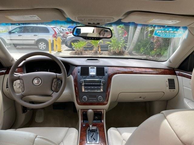 2006 Crimson Pearl /Shale Cadillac DTS w/1SC LOW MILES 49863 SUNROOF PEARL RED (1G6KD57Y26U) with an 4.6L DOHC V8 Northstar Engine engine, Automatic transmission, located at 4701 North Dixie Hwy, Pompano Beach, FL, 33064, (954) 422-2889, 26.240938, -80.123474 - OUR WEBPAGE FLORIDACARS1.COM HAS OVER 100 PHOTOS AND FREE CARFAX LINK 2006 Cadillac DTS Luxury Sedan 4 DR 4.6L V8 F Gasoline 25 MPG Front Wheel Drive Features A/C Seat(s) ABS Brakes Air Conditioning Alloy Wheels AM/FM Stereo Automatic Transmission Auxiliary Audio Input Bluetooth Technology CD Audio- Photo#91