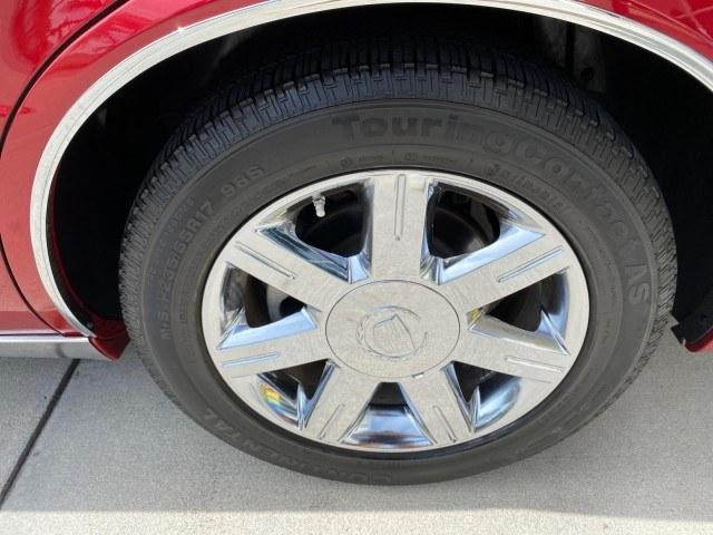 2006 Crimson Pearl /Shale Cadillac DTS w/1SC LOW MILES 49863 SUNROOF PEARL RED (1G6KD57Y26U) with an 4.6L DOHC V8 Northstar Engine engine, Automatic transmission, located at 4701 North Dixie Hwy, Pompano Beach, FL, 33064, (954) 422-2889, 26.240938, -80.123474 - OUR WEBPAGE FLORIDACARS1.COM HAS OVER 100 PHOTOS AND FREE CARFAX LINK 2006 Cadillac DTS Luxury Sedan 4 DR 4.6L V8 F Gasoline 25 MPG Front Wheel Drive Features A/C Seat(s) ABS Brakes Air Conditioning Alloy Wheels AM/FM Stereo Automatic Transmission Auxiliary Audio Input Bluetooth Technology CD Audio- Photo#98