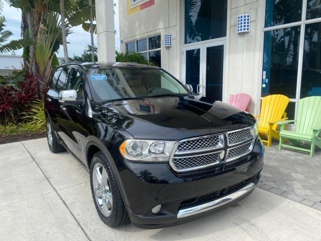 2011 Brilliant Black Crystal Pearl /Black/Tan Dodge Durango Citadel 4WD LOW MILES 60,759 (1D4SD5GTXBC) with an 5.7L V8 VVT Hemi Multi Displacement Engine engine, Automatic transmission, located at 4701 North Dixie Hwy, Pompano Beach, FL, 33064, (954) 422-2889, 26.240938, -80.123474 - OUR WEBPAGE FLORIDACARS1.COM HAS OVER 100 PHOTOS AND FREE CARFAX LINK 2011 Dodge Durango Citadel 4 Door Wagon/Sport Utility 5.7L V8 F OHV 16V Gasoline 20 MPG Rear Wheel Drive Features 20 Inch Plus Wheels 4WD/AWD A/C Seat(s) ABS Brakes Air Conditioning Alloy Wheels AM/FM Stereo Automated Cruise Contr- Photo#1