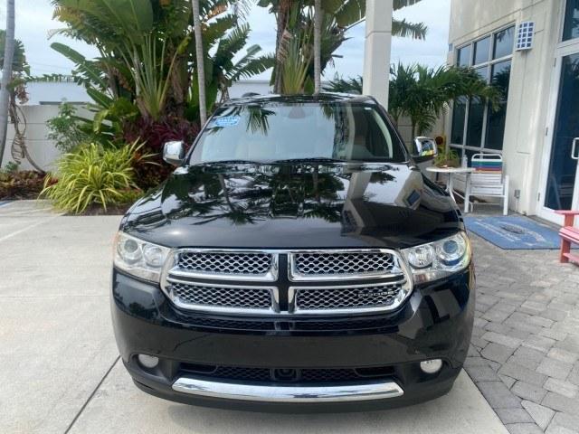 2011 Brilliant Black Crystal Pearl /Black/Tan Dodge Durango Citadel 4WD LOW MILES 60,759 (1D4SD5GTXBC) with an 5.7L V8 VVT Hemi Multi Displacement Engine engine, Automatic transmission, located at 4701 North Dixie Hwy, Pompano Beach, FL, 33064, (954) 422-2889, 26.240938, -80.123474 - OUR WEBPAGE FLORIDACARS1.COM HAS OVER 100 PHOTOS AND FREE CARFAX LINK 2011 Dodge Durango Citadel 4 Door Wagon/Sport Utility 5.7L V8 F OHV 16V Gasoline 20 MPG Rear Wheel Drive Features 20 Inch Plus Wheels 4WD/AWD A/C Seat(s) ABS Brakes Air Conditioning Alloy Wheels AM/FM Stereo Automated Cruise Contr- Photo#2