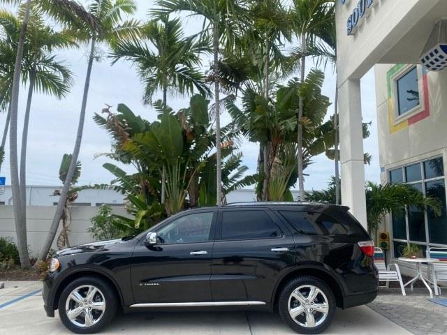 2011 Brilliant Black Crystal Pearl /Black/Tan Dodge Durango Citadel 4WD LOW MILES 60,759 (1D4SD5GTXBC) with an 5.7L V8 VVT Hemi Multi Displacement Engine engine, Automatic transmission, located at 4701 North Dixie Hwy, Pompano Beach, FL, 33064, (954) 422-2889, 26.240938, -80.123474 - OUR WEBPAGE FLORIDACARS1.COM HAS OVER 100 PHOTOS AND FREE CARFAX LINK 2011 Dodge Durango Citadel 4 Door Wagon/Sport Utility 5.7L V8 F OHV 16V Gasoline 20 MPG Rear Wheel Drive Features 20 Inch Plus Wheels 4WD/AWD A/C Seat(s) ABS Brakes Air Conditioning Alloy Wheels AM/FM Stereo Automated Cruise Contr- Photo#4