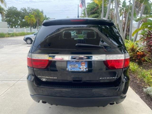 2011 Brilliant Black Crystal Pearl /Black/Tan Dodge Durango Citadel 4WD LOW MILES 60,759 (1D4SD5GTXBC) with an 5.7L V8 VVT Hemi Multi Displacement Engine engine, Automatic transmission, located at 4701 North Dixie Hwy, Pompano Beach, FL, 33064, (954) 422-2889, 26.240938, -80.123474 - OUR WEBPAGE FLORIDACARS1.COM HAS OVER 100 PHOTOS AND FREE CARFAX LINK 2011 Dodge Durango Citadel 4 Door Wagon/Sport Utility 5.7L V8 F OHV 16V Gasoline 20 MPG Rear Wheel Drive Features 20 Inch Plus Wheels 4WD/AWD A/C Seat(s) ABS Brakes Air Conditioning Alloy Wheels AM/FM Stereo Automated Cruise Contr- Photo#6