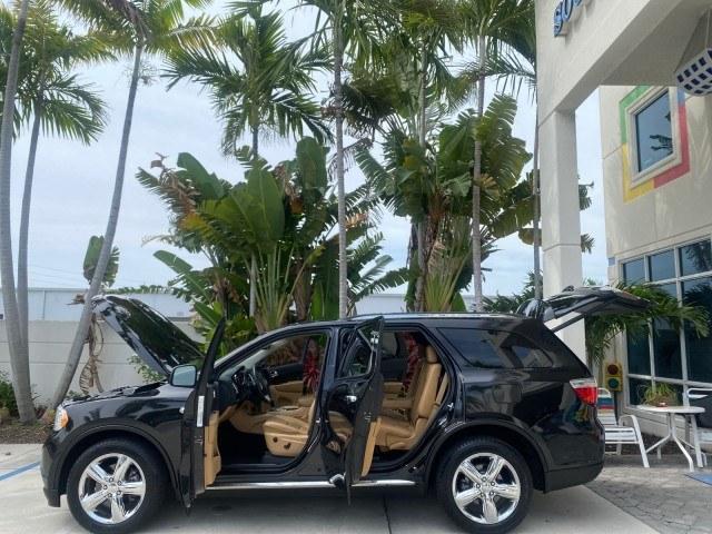 2011 Brilliant Black Crystal Pearl /Black/Tan Dodge Durango Citadel 4WD LOW MILES 60,759 (1D4SD5GTXBC) with an 5.7L V8 VVT Hemi Multi Displacement Engine engine, Automatic transmission, located at 4701 North Dixie Hwy, Pompano Beach, FL, 33064, (954) 422-2889, 26.240938, -80.123474 - OUR WEBPAGE FLORIDACARS1.COM HAS OVER 100 PHOTOS AND FREE CARFAX LINK 2011 Dodge Durango Citadel 4 Door Wagon/Sport Utility 5.7L V8 F OHV 16V Gasoline 20 MPG Rear Wheel Drive Features 20 Inch Plus Wheels 4WD/AWD A/C Seat(s) ABS Brakes Air Conditioning Alloy Wheels AM/FM Stereo Automated Cruise Contr- Photo#8