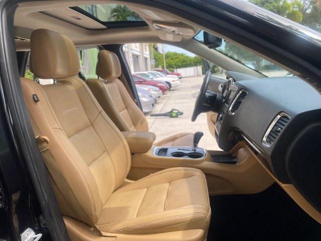 2011 Brilliant Black Crystal Pearl /Black/Tan Dodge Durango Citadel 4WD LOW MILES 60,759 (1D4SD5GTXBC) with an 5.7L V8 VVT Hemi Multi Displacement Engine engine, Automatic transmission, located at 4701 North Dixie Hwy, Pompano Beach, FL, 33064, (954) 422-2889, 26.240938, -80.123474 - OUR WEBPAGE FLORIDACARS1.COM HAS OVER 100 PHOTOS AND FREE CARFAX LINK 2011 Dodge Durango Citadel 4 Door Wagon/Sport Utility 5.7L V8 F OHV 16V Gasoline 20 MPG Rear Wheel Drive Features 20 Inch Plus Wheels 4WD/AWD A/C Seat(s) ABS Brakes Air Conditioning Alloy Wheels AM/FM Stereo Automated Cruise Contr- Photo#12