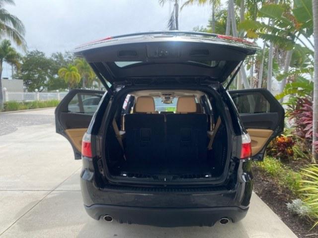 2011 Brilliant Black Crystal Pearl /Black/Tan Dodge Durango Citadel 4WD LOW MILES 60,759 (1D4SD5GTXBC) with an 5.7L V8 VVT Hemi Multi Displacement Engine engine, Automatic transmission, located at 4701 North Dixie Hwy, Pompano Beach, FL, 33064, (954) 422-2889, 26.240938, -80.123474 - OUR WEBPAGE FLORIDACARS1.COM HAS OVER 100 PHOTOS AND FREE CARFAX LINK 2011 Dodge Durango Citadel 4 Door Wagon/Sport Utility 5.7L V8 F OHV 16V Gasoline 20 MPG Rear Wheel Drive Features 20 Inch Plus Wheels 4WD/AWD A/C Seat(s) ABS Brakes Air Conditioning Alloy Wheels AM/FM Stereo Automated Cruise Contr- Photo#15