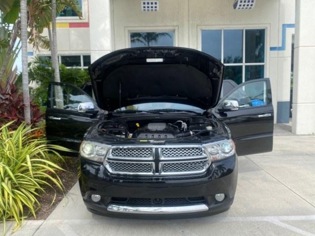 2011 Brilliant Black Crystal Pearl /Black/Tan Dodge Durango Citadel 4WD LOW MILES 60,759 (1D4SD5GTXBC) with an 5.7L V8 VVT Hemi Multi Displacement Engine engine, Automatic transmission, located at 4701 North Dixie Hwy, Pompano Beach, FL, 33064, (954) 422-2889, 26.240938, -80.123474 - OUR WEBPAGE FLORIDACARS1.COM HAS OVER 100 PHOTOS AND FREE CARFAX LINK 2011 Dodge Durango Citadel 4 Door Wagon/Sport Utility 5.7L V8 F OHV 16V Gasoline 20 MPG Rear Wheel Drive Features 20 Inch Plus Wheels 4WD/AWD A/C Seat(s) ABS Brakes Air Conditioning Alloy Wheels AM/FM Stereo Automated Cruise Contr- Photo#16