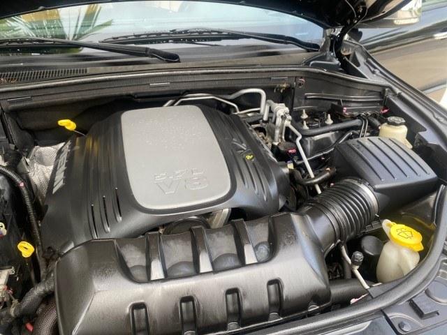 2011 Brilliant Black Crystal Pearl /Black/Tan Dodge Durango Citadel 4WD LOW MILES 60,759 (1D4SD5GTXBC) with an 5.7L V8 VVT Hemi Multi Displacement Engine engine, Automatic transmission, located at 4701 North Dixie Hwy, Pompano Beach, FL, 33064, (954) 422-2889, 26.240938, -80.123474 - OUR WEBPAGE FLORIDACARS1.COM HAS OVER 100 PHOTOS AND FREE CARFAX LINK 2011 Dodge Durango Citadel 4 Door Wagon/Sport Utility 5.7L V8 F OHV 16V Gasoline 20 MPG Rear Wheel Drive Features 20 Inch Plus Wheels 4WD/AWD A/C Seat(s) ABS Brakes Air Conditioning Alloy Wheels AM/FM Stereo Automated Cruise Contr- Photo#24