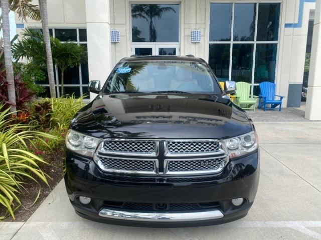 2011 Brilliant Black Crystal Pearl /Black/Tan Dodge Durango Citadel 4WD LOW MILES 60,759 (1D4SD5GTXBC) with an 5.7L V8 VVT Hemi Multi Displacement Engine engine, Automatic transmission, located at 4701 North Dixie Hwy, Pompano Beach, FL, 33064, (954) 422-2889, 26.240938, -80.123474 - OUR WEBPAGE FLORIDACARS1.COM HAS OVER 100 PHOTOS AND FREE CARFAX LINK 2011 Dodge Durango Citadel 4 Door Wagon/Sport Utility 5.7L V8 F OHV 16V Gasoline 20 MPG Rear Wheel Drive Features 20 Inch Plus Wheels 4WD/AWD A/C Seat(s) ABS Brakes Air Conditioning Alloy Wheels AM/FM Stereo Automated Cruise Contr- Photo#26