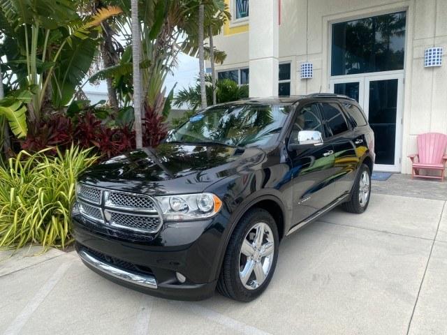 2011 Brilliant Black Crystal Pearl /Black/Tan Dodge Durango Citadel 4WD LOW MILES 60,759 (1D4SD5GTXBC) with an 5.7L V8 VVT Hemi Multi Displacement Engine engine, Automatic transmission, located at 4701 North Dixie Hwy, Pompano Beach, FL, 33064, (954) 422-2889, 26.240938, -80.123474 - OUR WEBPAGE FLORIDACARS1.COM HAS OVER 100 PHOTOS AND FREE CARFAX LINK 2011 Dodge Durango Citadel 4 Door Wagon/Sport Utility 5.7L V8 F OHV 16V Gasoline 20 MPG Rear Wheel Drive Features 20 Inch Plus Wheels 4WD/AWD A/C Seat(s) ABS Brakes Air Conditioning Alloy Wheels AM/FM Stereo Automated Cruise Contr- Photo#27