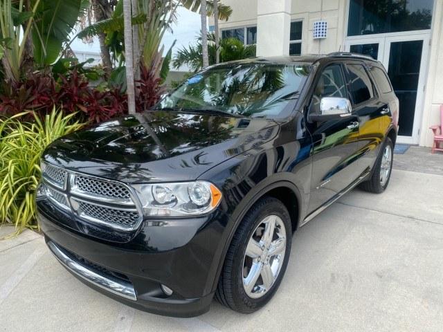 2011 Brilliant Black Crystal Pearl /Black/Tan Dodge Durango Citadel 4WD LOW MILES 60,759 (1D4SD5GTXBC) with an 5.7L V8 VVT Hemi Multi Displacement Engine engine, Automatic transmission, located at 4701 North Dixie Hwy, Pompano Beach, FL, 33064, (954) 422-2889, 26.240938, -80.123474 - OUR WEBPAGE FLORIDACARS1.COM HAS OVER 100 PHOTOS AND FREE CARFAX LINK 2011 Dodge Durango Citadel 4 Door Wagon/Sport Utility 5.7L V8 F OHV 16V Gasoline 20 MPG Rear Wheel Drive Features 20 Inch Plus Wheels 4WD/AWD A/C Seat(s) ABS Brakes Air Conditioning Alloy Wheels AM/FM Stereo Automated Cruise Contr- Photo#28