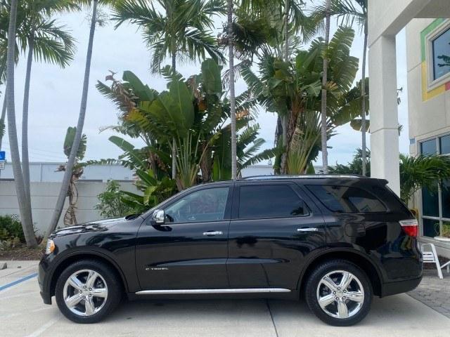 2011 Brilliant Black Crystal Pearl /Black/Tan Dodge Durango Citadel 4WD LOW MILES 60,759 (1D4SD5GTXBC) with an 5.7L V8 VVT Hemi Multi Displacement Engine engine, Automatic transmission, located at 4701 North Dixie Hwy, Pompano Beach, FL, 33064, (954) 422-2889, 26.240938, -80.123474 - OUR WEBPAGE FLORIDACARS1.COM HAS OVER 100 PHOTOS AND FREE CARFAX LINK 2011 Dodge Durango Citadel 4 Door Wagon/Sport Utility 5.7L V8 F OHV 16V Gasoline 20 MPG Rear Wheel Drive Features 20 Inch Plus Wheels 4WD/AWD A/C Seat(s) ABS Brakes Air Conditioning Alloy Wheels AM/FM Stereo Automated Cruise Contr- Photo#29