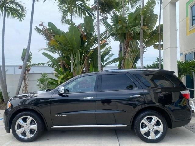 2011 Brilliant Black Crystal Pearl /Black/Tan Dodge Durango Citadel 4WD LOW MILES 60,759 (1D4SD5GTXBC) with an 5.7L V8 VVT Hemi Multi Displacement Engine engine, Automatic transmission, located at 4701 North Dixie Hwy, Pompano Beach, FL, 33064, (954) 422-2889, 26.240938, -80.123474 - OUR WEBPAGE FLORIDACARS1.COM HAS OVER 100 PHOTOS AND FREE CARFAX LINK 2011 Dodge Durango Citadel 4 Door Wagon/Sport Utility 5.7L V8 F OHV 16V Gasoline 20 MPG Rear Wheel Drive Features 20 Inch Plus Wheels 4WD/AWD A/C Seat(s) ABS Brakes Air Conditioning Alloy Wheels AM/FM Stereo Automated Cruise Contr- Photo#30
