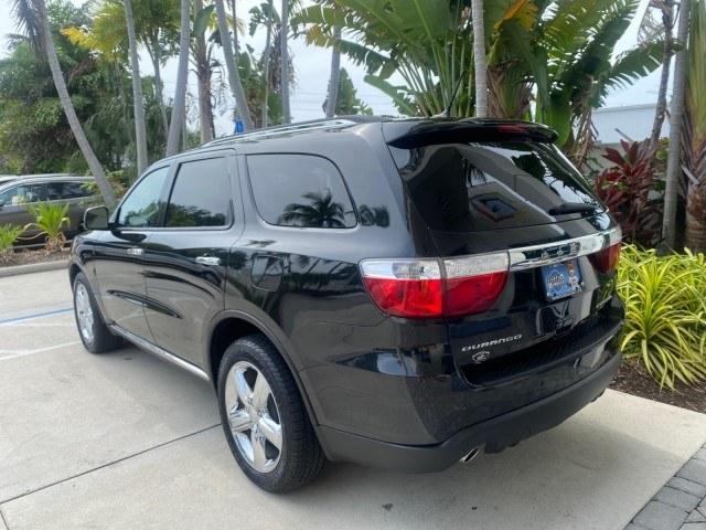 2011 Brilliant Black Crystal Pearl /Black/Tan Dodge Durango Citadel 4WD LOW MILES 60,759 (1D4SD5GTXBC) with an 5.7L V8 VVT Hemi Multi Displacement Engine engine, Automatic transmission, located at 4701 North Dixie Hwy, Pompano Beach, FL, 33064, (954) 422-2889, 26.240938, -80.123474 - OUR WEBPAGE FLORIDACARS1.COM HAS OVER 100 PHOTOS AND FREE CARFAX LINK 2011 Dodge Durango Citadel 4 Door Wagon/Sport Utility 5.7L V8 F OHV 16V Gasoline 20 MPG Rear Wheel Drive Features 20 Inch Plus Wheels 4WD/AWD A/C Seat(s) ABS Brakes Air Conditioning Alloy Wheels AM/FM Stereo Automated Cruise Contr- Photo#31