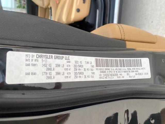 2011 Brilliant Black Crystal Pearl /Black/Tan Dodge Durango Citadel 4WD LOW MILES 60,759 (1D4SD5GTXBC) with an 5.7L V8 VVT Hemi Multi Displacement Engine engine, Automatic transmission, located at 4701 North Dixie Hwy, Pompano Beach, FL, 33064, (954) 422-2889, 26.240938, -80.123474 - OUR WEBPAGE FLORIDACARS1.COM HAS OVER 100 PHOTOS AND FREE CARFAX LINK 2011 Dodge Durango Citadel 4 Door Wagon/Sport Utility 5.7L V8 F OHV 16V Gasoline 20 MPG Rear Wheel Drive Features 20 Inch Plus Wheels 4WD/AWD A/C Seat(s) ABS Brakes Air Conditioning Alloy Wheels AM/FM Stereo Automated Cruise Contr- Photo#72