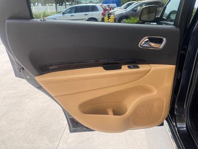 2011 Brilliant Black Crystal Pearl /Black/Tan Dodge Durango Citadel 4WD LOW MILES 60,759 (1D4SD5GTXBC) with an 5.7L V8 VVT Hemi Multi Displacement Engine engine, Automatic transmission, located at 4701 North Dixie Hwy, Pompano Beach, FL, 33064, (954) 422-2889, 26.240938, -80.123474 - OUR WEBPAGE FLORIDACARS1.COM HAS OVER 100 PHOTOS AND FREE CARFAX LINK 2011 Dodge Durango Citadel 4 Door Wagon/Sport Utility 5.7L V8 F OHV 16V Gasoline 20 MPG Rear Wheel Drive Features 20 Inch Plus Wheels 4WD/AWD A/C Seat(s) ABS Brakes Air Conditioning Alloy Wheels AM/FM Stereo Automated Cruise Contr- Photo#75
