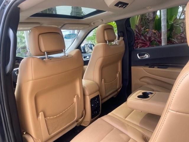 2011 Brilliant Black Crystal Pearl /Black/Tan Dodge Durango Citadel 4WD LOW MILES 60,759 (1D4SD5GTXBC) with an 5.7L V8 VVT Hemi Multi Displacement Engine engine, Automatic transmission, located at 4701 North Dixie Hwy, Pompano Beach, FL, 33064, (954) 422-2889, 26.240938, -80.123474 - OUR WEBPAGE FLORIDACARS1.COM HAS OVER 100 PHOTOS AND FREE CARFAX LINK 2011 Dodge Durango Citadel 4 Door Wagon/Sport Utility 5.7L V8 F OHV 16V Gasoline 20 MPG Rear Wheel Drive Features 20 Inch Plus Wheels 4WD/AWD A/C Seat(s) ABS Brakes Air Conditioning Alloy Wheels AM/FM Stereo Automated Cruise Contr- Photo#80