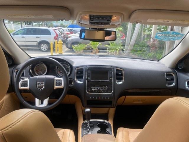 2011 Brilliant Black Crystal Pearl /Black/Tan Dodge Durango Citadel 4WD LOW MILES 60,759 (1D4SD5GTXBC) with an 5.7L V8 VVT Hemi Multi Displacement Engine engine, Automatic transmission, located at 4701 North Dixie Hwy, Pompano Beach, FL, 33064, (954) 422-2889, 26.240938, -80.123474 - OUR WEBPAGE FLORIDACARS1.COM HAS OVER 100 PHOTOS AND FREE CARFAX LINK 2011 Dodge Durango Citadel 4 Door Wagon/Sport Utility 5.7L V8 F OHV 16V Gasoline 20 MPG Rear Wheel Drive Features 20 Inch Plus Wheels 4WD/AWD A/C Seat(s) ABS Brakes Air Conditioning Alloy Wheels AM/FM Stereo Automated Cruise Contr- Photo#82