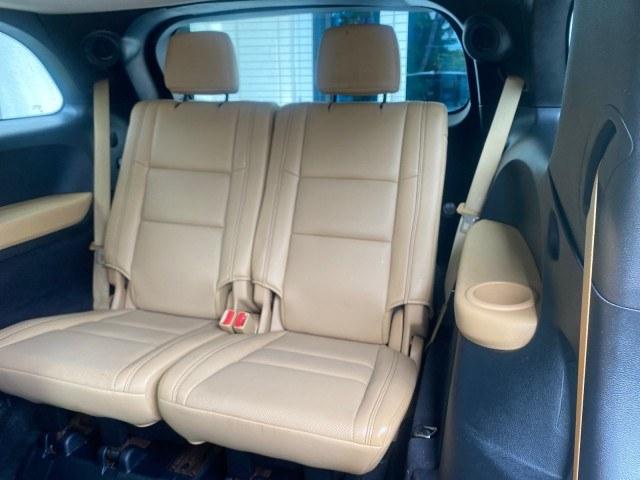 2011 Brilliant Black Crystal Pearl /Black/Tan Dodge Durango Citadel 4WD LOW MILES 60,759 (1D4SD5GTXBC) with an 5.7L V8 VVT Hemi Multi Displacement Engine engine, Automatic transmission, located at 4701 North Dixie Hwy, Pompano Beach, FL, 33064, (954) 422-2889, 26.240938, -80.123474 - OUR WEBPAGE FLORIDACARS1.COM HAS OVER 100 PHOTOS AND FREE CARFAX LINK 2011 Dodge Durango Citadel 4 Door Wagon/Sport Utility 5.7L V8 F OHV 16V Gasoline 20 MPG Rear Wheel Drive Features 20 Inch Plus Wheels 4WD/AWD A/C Seat(s) ABS Brakes Air Conditioning Alloy Wheels AM/FM Stereo Automated Cruise Contr- Photo#93