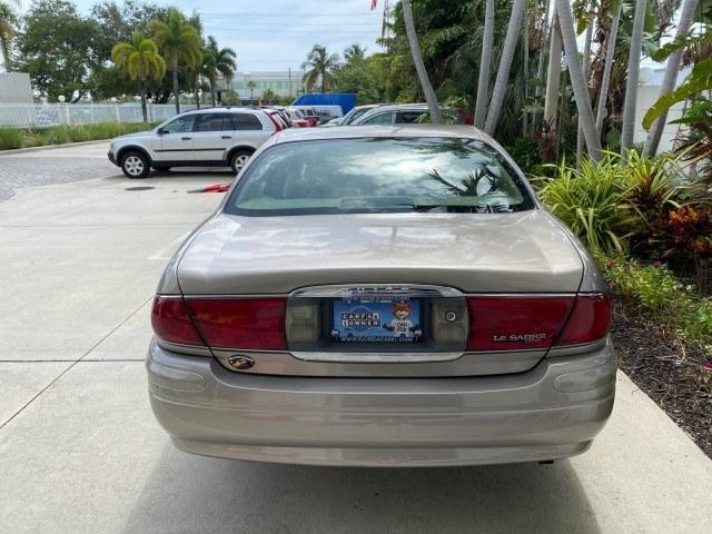 2004 Light Bronzemist Metallic /Cashmere Buick LeSabre Custom LOW MILES 65,489 (1G4HP54K444) with an 3.8L 3800 V6 SFI Engine engine, Automatic transmission, located at 4701 North Dixie Hwy, Pompano Beach, FL, 33064, (954) 422-2889, 26.240938, -80.123474 - OUR WEBPAGE FLORIDACARS1.COM HAS OVER 100 PHOTOS AND FREE CARFAX LINK 2004 Buick Lesabre Custom Sedan 4 DR 3.8L V6 F OHV Gasoline 29 MPG Front Wheel Drive Features ABS Brakes Air Conditioning Alloy Wheels AM/FM Stereo Automatic Transmission Cassette Player CD Audio Cloth Seats Cruise Control Power L- Photo#6