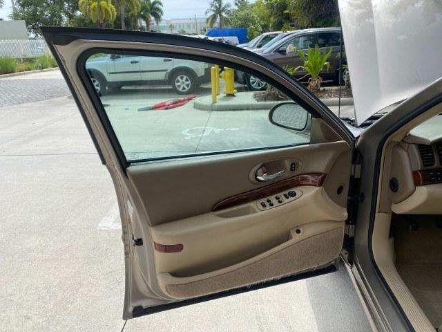 2004 Light Bronzemist Metallic /Cashmere Buick LeSabre Custom LOW MILES 65,489 (1G4HP54K444) with an 3.8L 3800 V6 SFI Engine engine, Automatic transmission, located at 4701 North Dixie Hwy, Pompano Beach, FL, 33064, (954) 422-2889, 26.240938, -80.123474 - OUR WEBPAGE FLORIDACARS1.COM HAS OVER 100 PHOTOS AND FREE CARFAX LINK 2004 Buick Lesabre Custom Sedan 4 DR 3.8L V6 F OHV Gasoline 29 MPG Front Wheel Drive Features ABS Brakes Air Conditioning Alloy Wheels AM/FM Stereo Automatic Transmission Cassette Player CD Audio Cloth Seats Cruise Control Power L- Photo#9