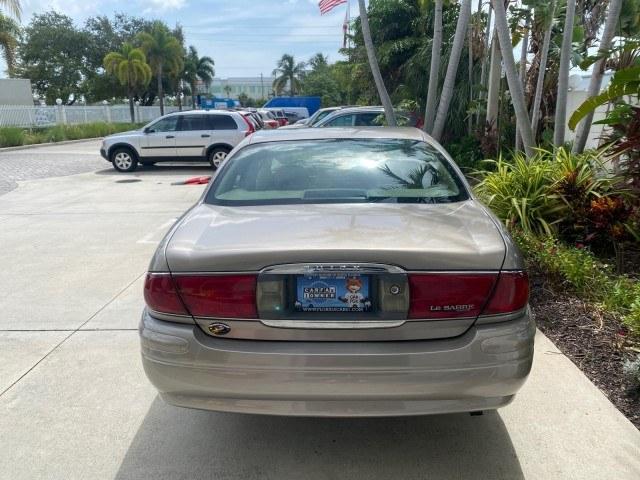 2004 Light Bronzemist Metallic /Cashmere Buick LeSabre Custom LOW MILES 65,489 (1G4HP54K444) with an 3.8L 3800 V6 SFI Engine engine, Automatic transmission, located at 4701 North Dixie Hwy, Pompano Beach, FL, 33064, (954) 422-2889, 26.240938, -80.123474 - OUR WEBPAGE FLORIDACARS1.COM HAS OVER 100 PHOTOS AND FREE CARFAX LINK 2004 Buick Lesabre Custom Sedan 4 DR 3.8L V6 F OHV Gasoline 29 MPG Front Wheel Drive Features ABS Brakes Air Conditioning Alloy Wheels AM/FM Stereo Automatic Transmission Cassette Player CD Audio Cloth Seats Cruise Control Power L- Photo#34