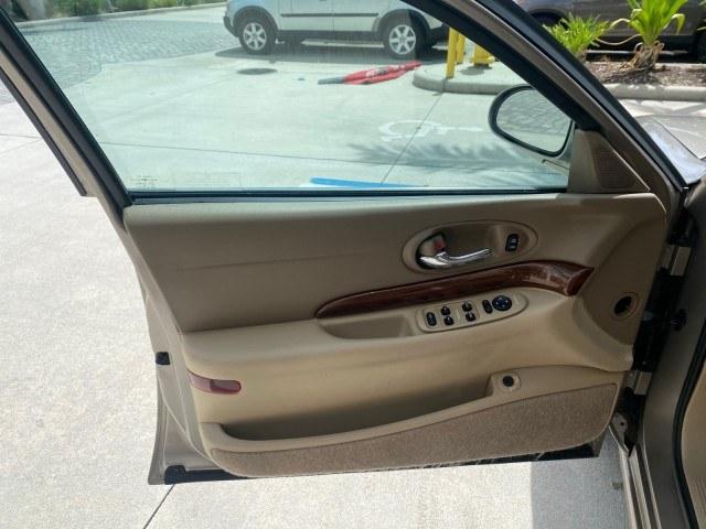 2004 Light Bronzemist Metallic /Cashmere Buick LeSabre Custom LOW MILES 65,489 (1G4HP54K444) with an 3.8L 3800 V6 SFI Engine engine, Automatic transmission, located at 4701 North Dixie Hwy, Pompano Beach, FL, 33064, (954) 422-2889, 26.240938, -80.123474 - OUR WEBPAGE FLORIDACARS1.COM HAS OVER 100 PHOTOS AND FREE CARFAX LINK 2004 Buick Lesabre Custom Sedan 4 DR 3.8L V6 F OHV Gasoline 29 MPG Front Wheel Drive Features ABS Brakes Air Conditioning Alloy Wheels AM/FM Stereo Automatic Transmission Cassette Player CD Audio Cloth Seats Cruise Control Power L- Photo#42