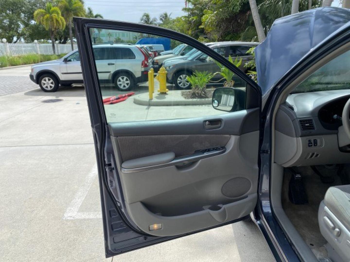 2006 Blue Mirage Metallic /Stone Toyota Sienna CE VAN LOW MILES 57,411 (5TDZA23C06S) with an 3.3L 24-Valve SEFI DOHC VVT-i V6 Engine engine, Automatic transmission, located at 4701 North Dixie Hwy, Pompano Beach, FL, 33064, (954) 422-2889, 26.240938, -80.123474 - OUR WEBPAGE FLORIDACARS1.COM HAS OVER 100 PHOTOS AND FREE CARFAX LINK 2006 Toyota Sienna CE 7 Passenger Van 3.3L V6 Gasoline 26 MPG Front Wheel Drive Features ABS Brakes Air Conditioning Alloy Wheels AM/FM Stereo Automatic Transmission CD Audio Cloth Seats Cruise Control Fold-Away Third Row Power Lo- Photo#9