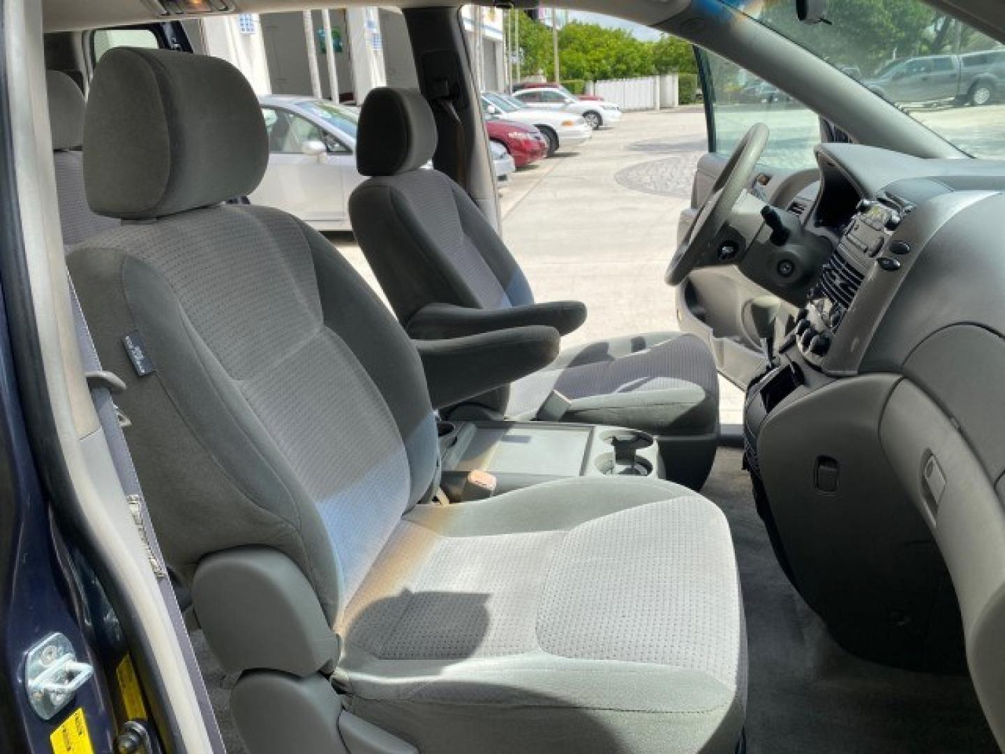 2006 Blue Mirage Metallic /Stone Toyota Sienna CE VAN LOW MILES 57,411 (5TDZA23C06S) with an 3.3L 24-Valve SEFI DOHC VVT-i V6 Engine engine, Automatic transmission, located at 4701 North Dixie Hwy, Pompano Beach, FL, 33064, (954) 422-2889, 26.240938, -80.123474 - OUR WEBPAGE FLORIDACARS1.COM HAS OVER 100 PHOTOS AND FREE CARFAX LINK 2006 Toyota Sienna CE 7 Passenger Van 3.3L V6 Gasoline 26 MPG Front Wheel Drive Features ABS Brakes Air Conditioning Alloy Wheels AM/FM Stereo Automatic Transmission CD Audio Cloth Seats Cruise Control Fold-Away Third Row Power Lo- Photo#12
