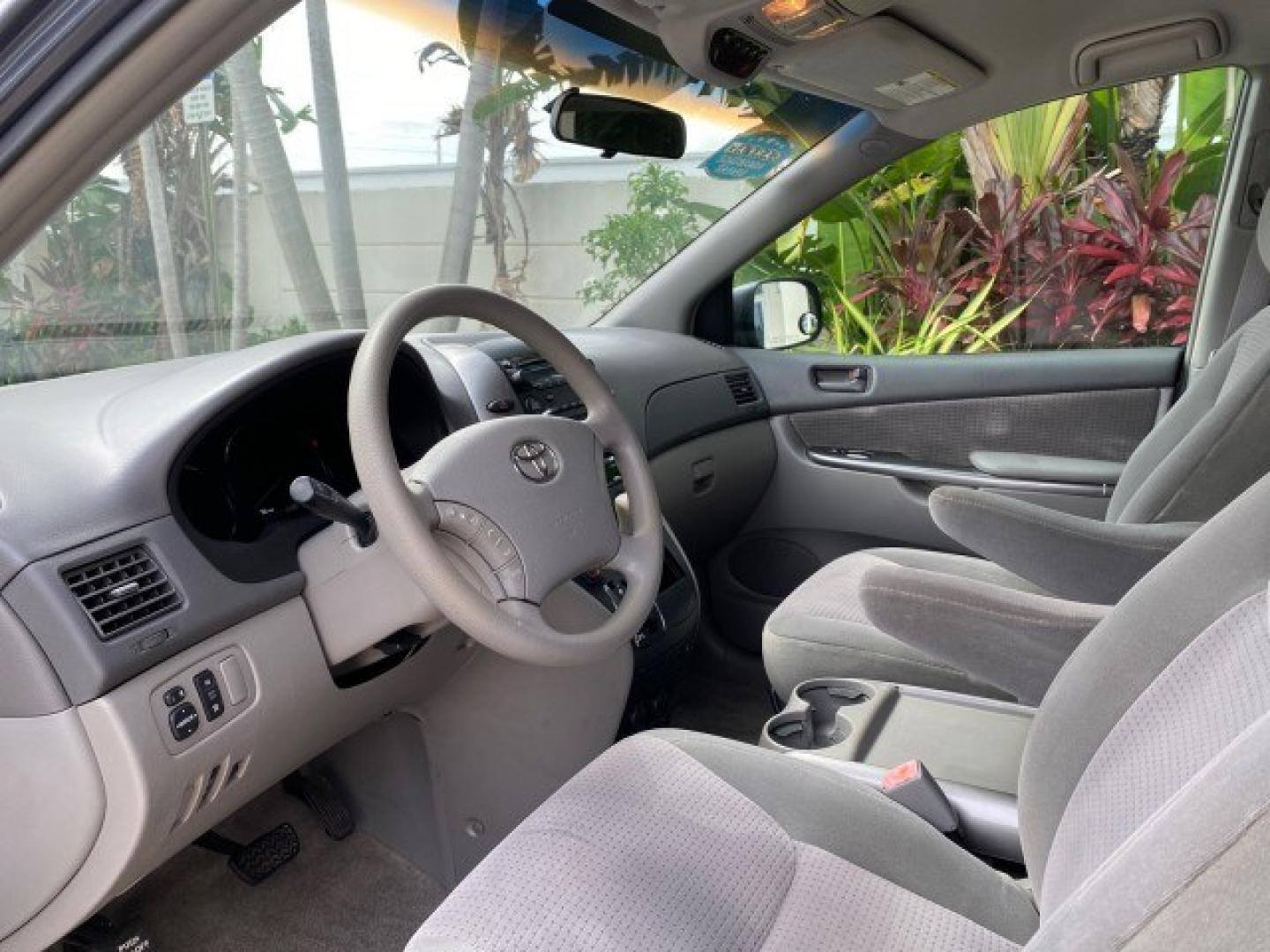 2006 Blue Mirage Metallic /Stone Toyota Sienna CE VAN LOW MILES 57,411 (5TDZA23C06S) with an 3.3L 24-Valve SEFI DOHC VVT-i V6 Engine engine, Automatic transmission, located at 4701 North Dixie Hwy, Pompano Beach, FL, 33064, (954) 422-2889, 26.240938, -80.123474 - OUR WEBPAGE FLORIDACARS1.COM HAS OVER 100 PHOTOS AND FREE CARFAX LINK 2006 Toyota Sienna CE 7 Passenger Van 3.3L V6 Gasoline 26 MPG Front Wheel Drive Features ABS Brakes Air Conditioning Alloy Wheels AM/FM Stereo Automatic Transmission CD Audio Cloth Seats Cruise Control Fold-Away Third Row Power Lo- Photo#45