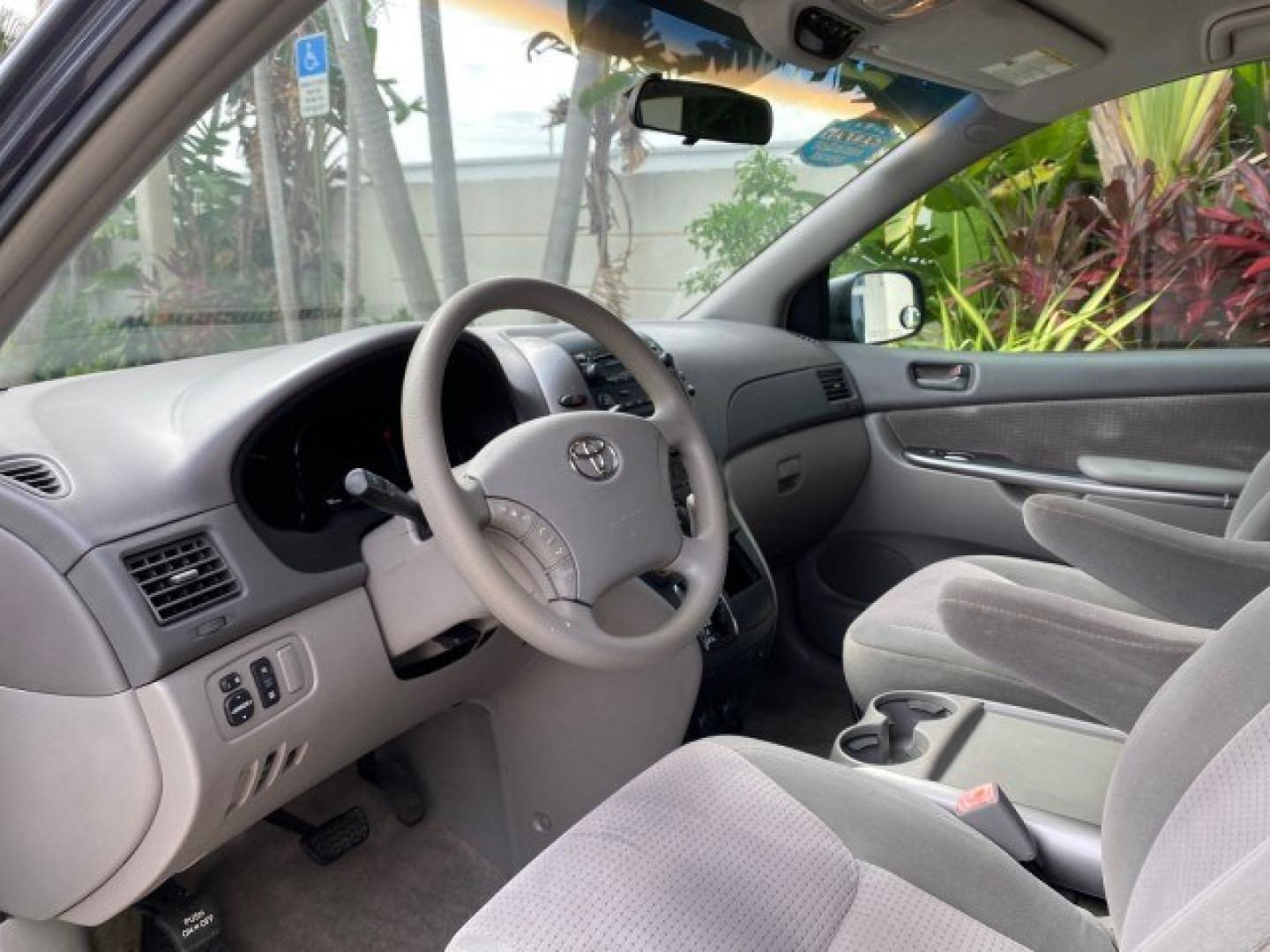 2006 Blue Mirage Metallic /Stone Toyota Sienna CE VAN LOW MILES 57,411 (5TDZA23C06S) with an 3.3L 24-Valve SEFI DOHC VVT-i V6 Engine engine, Automatic transmission, located at 4701 North Dixie Hwy, Pompano Beach, FL, 33064, (954) 422-2889, 26.240938, -80.123474 - OUR WEBPAGE FLORIDACARS1.COM HAS OVER 100 PHOTOS AND FREE CARFAX LINK 2006 Toyota Sienna CE 7 Passenger Van 3.3L V6 Gasoline 26 MPG Front Wheel Drive Features ABS Brakes Air Conditioning Alloy Wheels AM/FM Stereo Automatic Transmission CD Audio Cloth Seats Cruise Control Fold-Away Third Row Power Lo- Photo#46