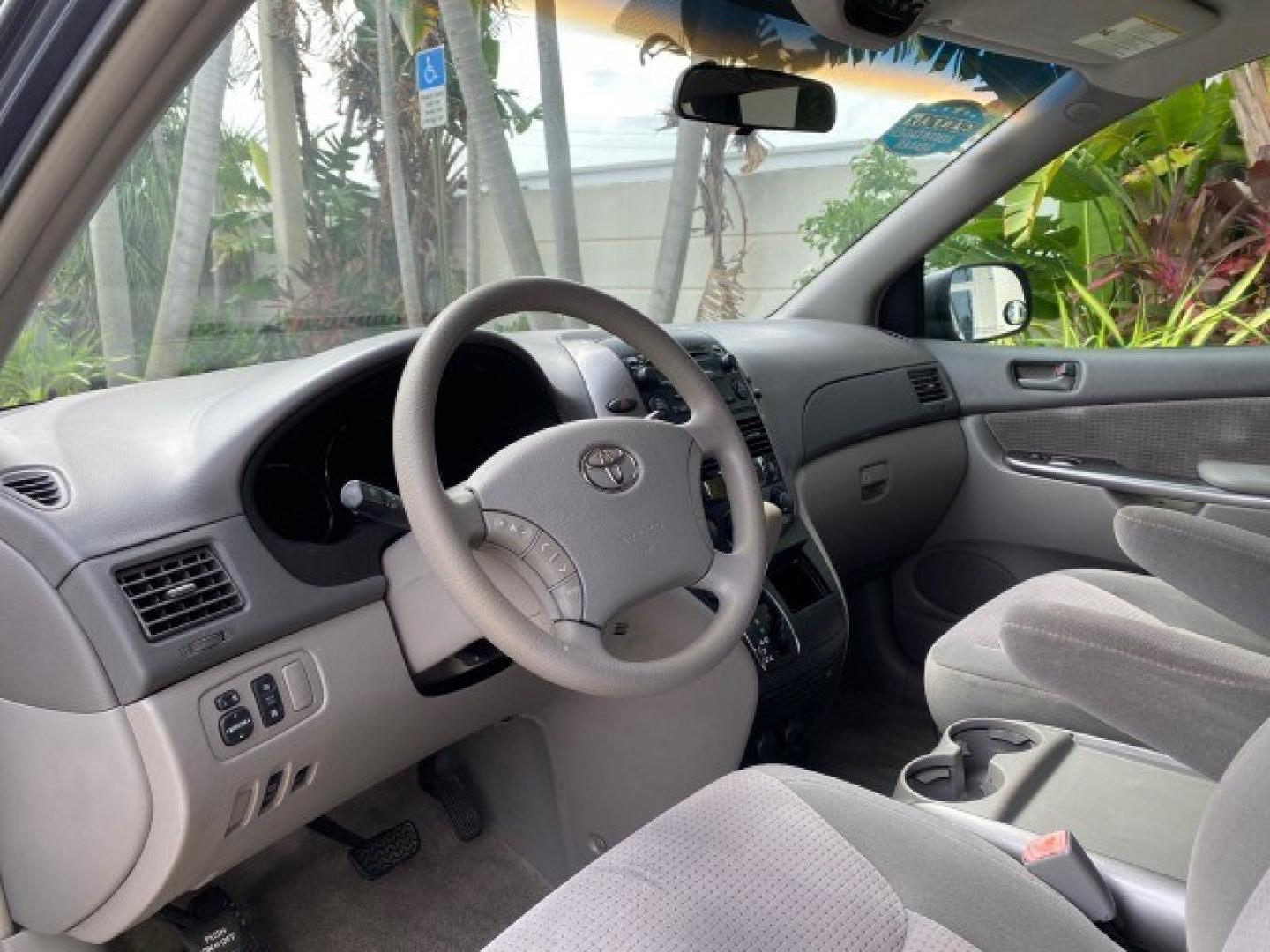 2006 Blue Mirage Metallic /Stone Toyota Sienna CE VAN LOW MILES 57,411 (5TDZA23C06S) with an 3.3L 24-Valve SEFI DOHC VVT-i V6 Engine engine, Automatic transmission, located at 4701 North Dixie Hwy, Pompano Beach, FL, 33064, (954) 422-2889, 26.240938, -80.123474 - OUR WEBPAGE FLORIDACARS1.COM HAS OVER 100 PHOTOS AND FREE CARFAX LINK 2006 Toyota Sienna CE 7 Passenger Van 3.3L V6 Gasoline 26 MPG Front Wheel Drive Features ABS Brakes Air Conditioning Alloy Wheels AM/FM Stereo Automatic Transmission CD Audio Cloth Seats Cruise Control Fold-Away Third Row Power Lo- Photo#47