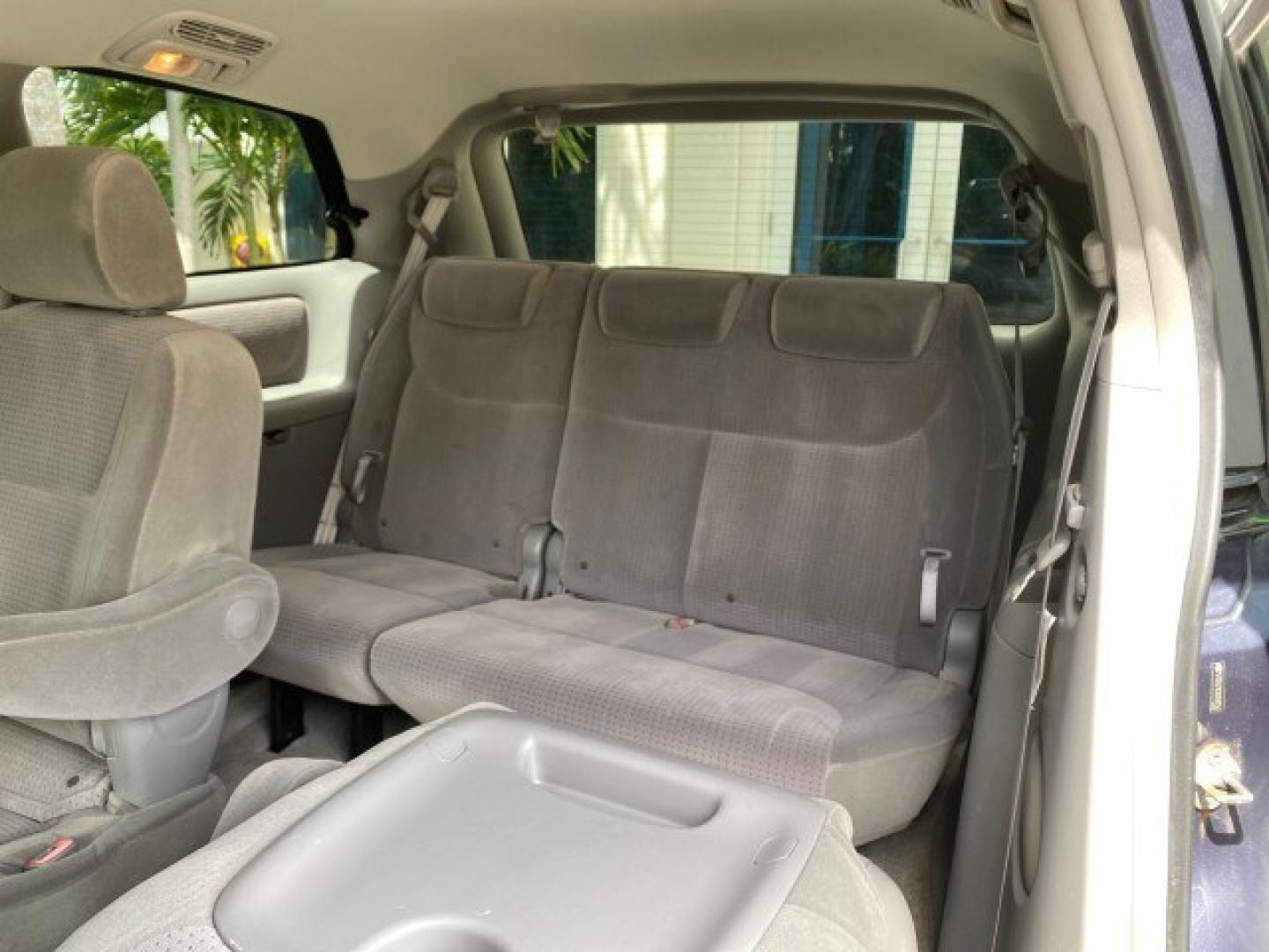 2006 Blue Mirage Metallic /Stone Toyota Sienna CE VAN LOW MILES 57,411 (5TDZA23C06S) with an 3.3L 24-Valve SEFI DOHC VVT-i V6 Engine engine, Automatic transmission, located at 4701 North Dixie Hwy, Pompano Beach, FL, 33064, (954) 422-2889, 26.240938, -80.123474 - OUR WEBPAGE FLORIDACARS1.COM HAS OVER 100 PHOTOS AND FREE CARFAX LINK 2006 Toyota Sienna CE 7 Passenger Van 3.3L V6 Gasoline 26 MPG Front Wheel Drive Features ABS Brakes Air Conditioning Alloy Wheels AM/FM Stereo Automatic Transmission CD Audio Cloth Seats Cruise Control Fold-Away Third Row Power Lo- Photo#85