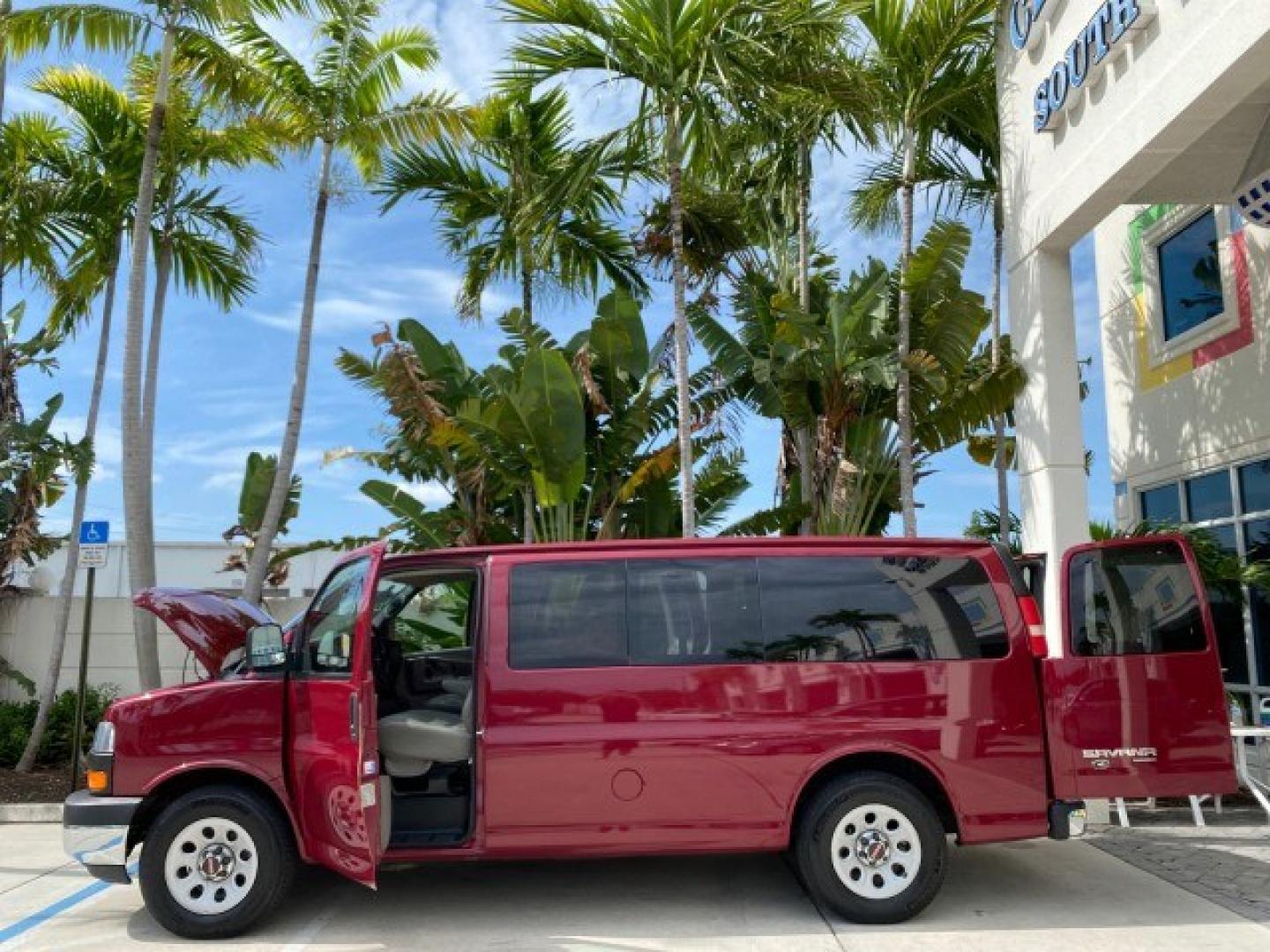 2009 Sport Red Metallic /Medium Pewter GMC Savana Passenger LOW MILES 53,014 1 OWNER 8 Passenger (1GKFG154891) with an 5.3L Vortec 1000 V8 SFI Engine engine, Automatic transmission, located at 4701 North Dixie Hwy, Pompano Beach, FL, 33064, (954) 422-2889, 26.240938, -80.123474 - OUR WEBPAGE FLORIDACARS1.COM HAS OVER 100 PHOTOS AND FREE CARFAX LINK 2009 GMC Savana LS 1500 1 OWNER 8 PASSENGER Van 5.3L V8 F OHV 16V Flex Fuel 16 MPG Rear Wheel Drive Features ABS Brakes Air Conditioning AM/FM Stereo Automatic Transmission CD Audio Cloth Seats Cruise Control Overhead Airbags Powe- Photo#8