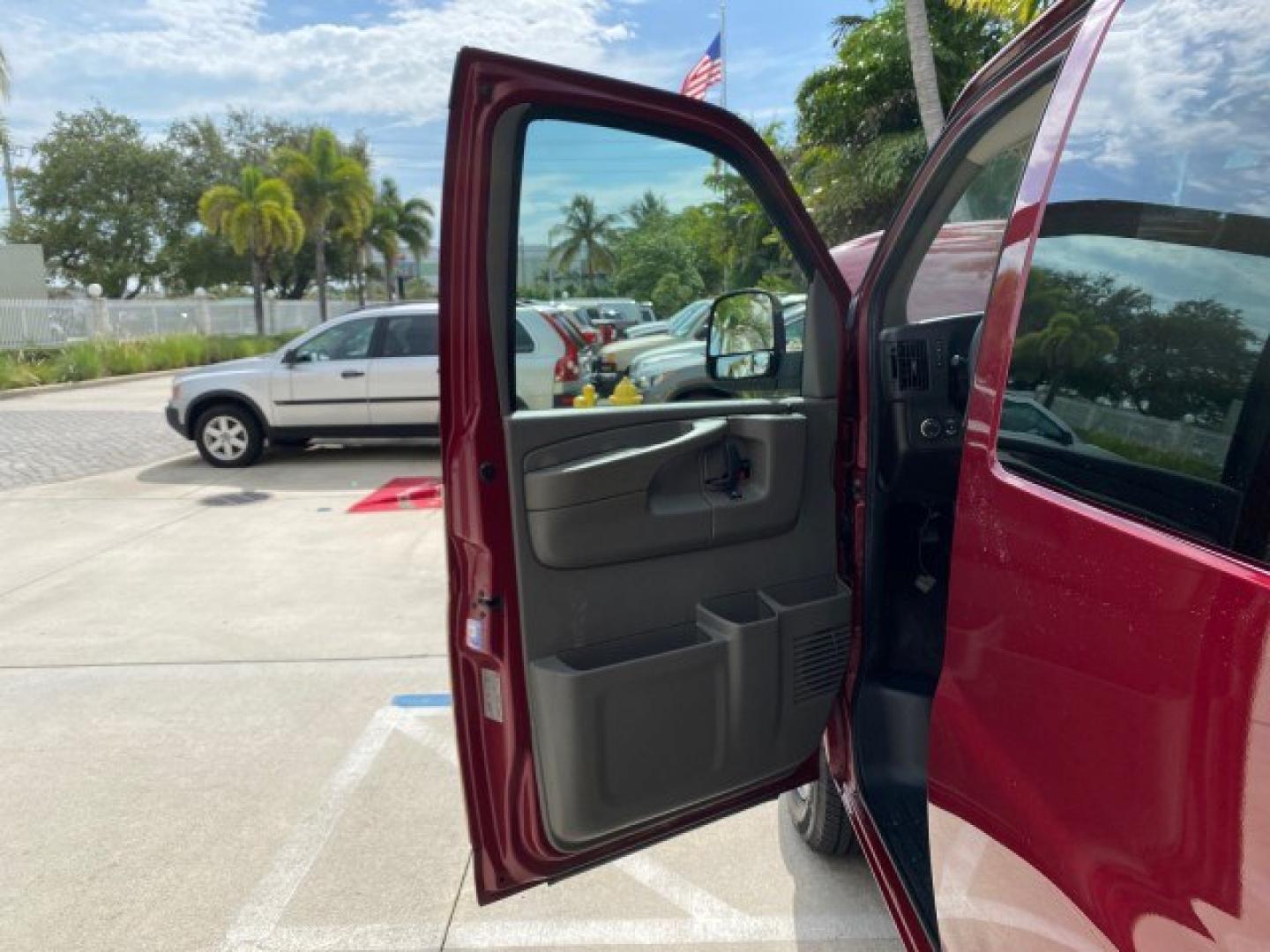 2009 Sport Red Metallic /Medium Pewter GMC Savana Passenger LOW MILES 53,014 1 OWNER 8 Passenger (1GKFG154891) with an 5.3L Vortec 1000 V8 SFI Engine engine, Automatic transmission, located at 4701 North Dixie Hwy, Pompano Beach, FL, 33064, (954) 422-2889, 26.240938, -80.123474 - OUR WEBPAGE FLORIDACARS1.COM HAS OVER 100 PHOTOS AND FREE CARFAX LINK 2009 GMC Savana LS 1500 1 OWNER 8 PASSENGER Van 5.3L V8 F OHV 16V Flex Fuel 16 MPG Rear Wheel Drive Features ABS Brakes Air Conditioning AM/FM Stereo Automatic Transmission CD Audio Cloth Seats Cruise Control Overhead Airbags Powe- Photo#9