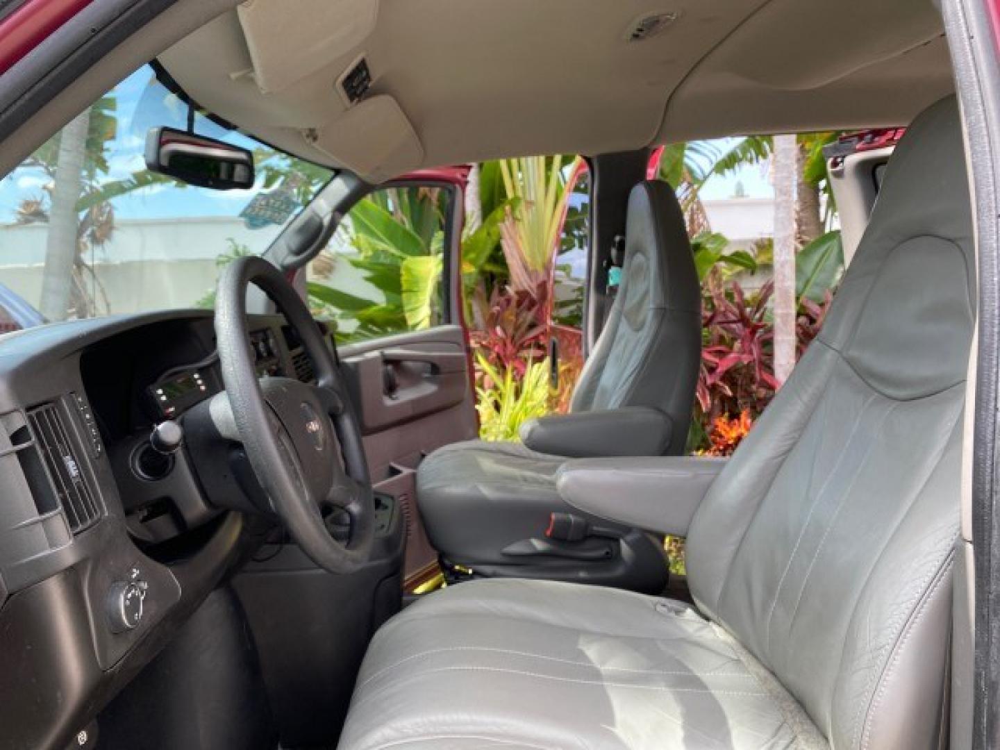 2009 Sport Red Metallic /Medium Pewter GMC Savana Passenger LOW MILES 53,014 1 OWNER 8 Passenger (1GKFG154891) with an 5.3L Vortec 1000 V8 SFI Engine engine, Automatic transmission, located at 4701 North Dixie Hwy, Pompano Beach, FL, 33064, (954) 422-2889, 26.240938, -80.123474 - OUR WEBPAGE FLORIDACARS1.COM HAS OVER 100 PHOTOS AND FREE CARFAX LINK 2009 GMC Savana LS 1500 1 OWNER 8 PASSENGER Van 5.3L V8 F OHV 16V Flex Fuel 16 MPG Rear Wheel Drive Features ABS Brakes Air Conditioning AM/FM Stereo Automatic Transmission CD Audio Cloth Seats Cruise Control Overhead Airbags Powe- Photo#10