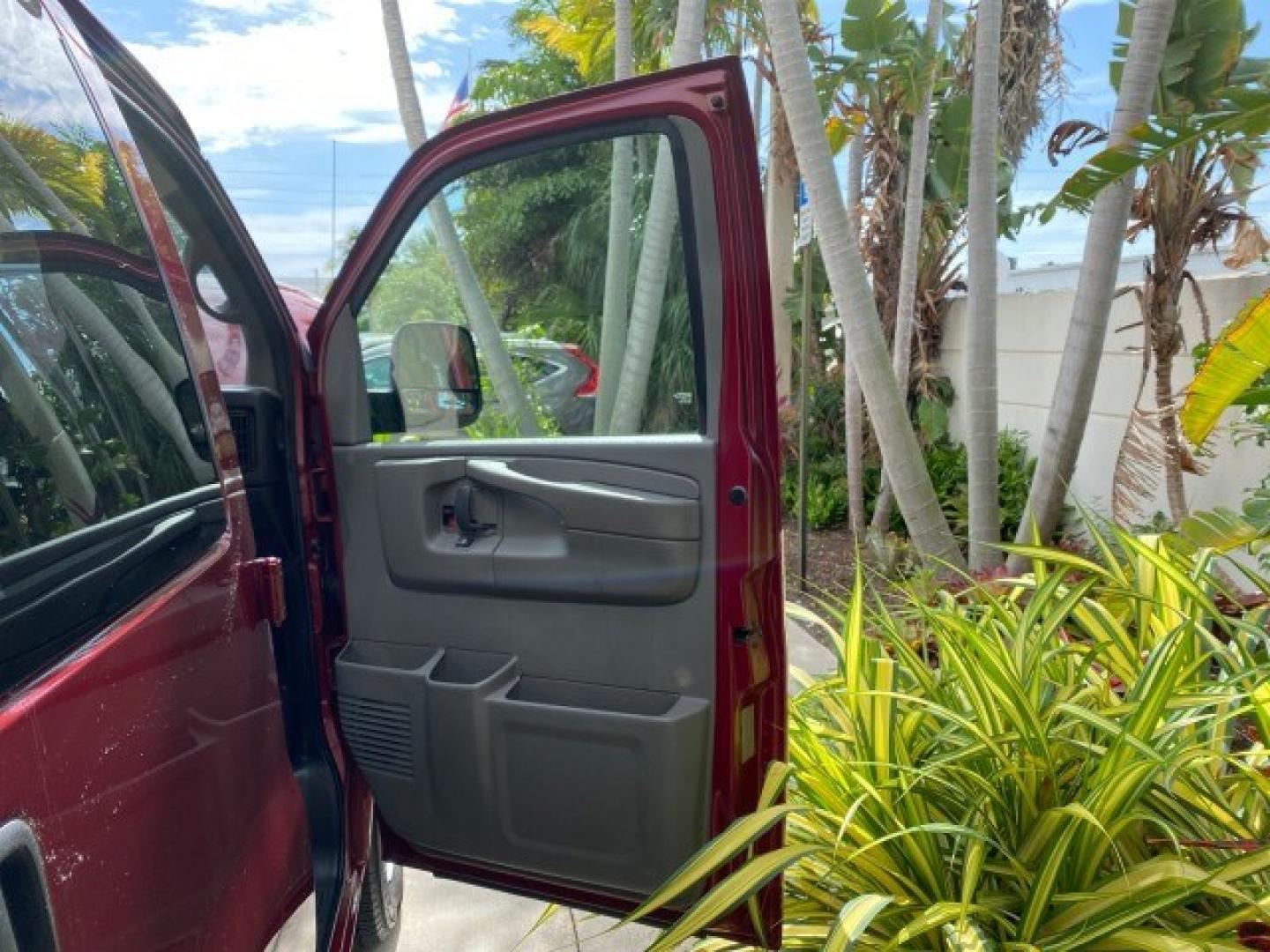 2009 Sport Red Metallic /Medium Pewter GMC Savana Passenger LOW MILES 53,014 1 OWNER 8 Passenger (1GKFG154891) with an 5.3L Vortec 1000 V8 SFI Engine engine, Automatic transmission, located at 4701 North Dixie Hwy, Pompano Beach, FL, 33064, (954) 422-2889, 26.240938, -80.123474 - OUR WEBPAGE FLORIDACARS1.COM HAS OVER 100 PHOTOS AND FREE CARFAX LINK 2009 GMC Savana LS 1500 1 OWNER 8 PASSENGER Van 5.3L V8 F OHV 16V Flex Fuel 16 MPG Rear Wheel Drive Features ABS Brakes Air Conditioning AM/FM Stereo Automatic Transmission CD Audio Cloth Seats Cruise Control Overhead Airbags Powe- Photo#11