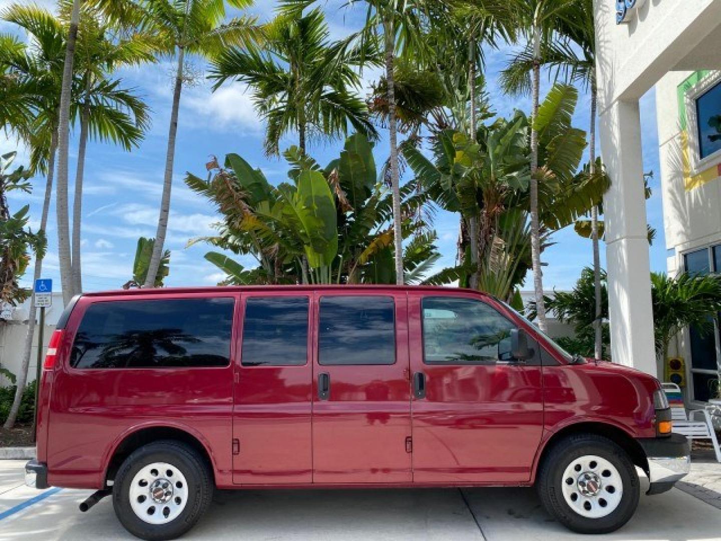 2009 Sport Red Metallic /Medium Pewter GMC Savana Passenger LOW MILES 53,014 1 OWNER 8 Passenger (1GKFG154891) with an 5.3L Vortec 1000 V8 SFI Engine engine, Automatic transmission, located at 4701 North Dixie Hwy, Pompano Beach, FL, 33064, (954) 422-2889, 26.240938, -80.123474 - OUR WEBPAGE FLORIDACARS1.COM HAS OVER 100 PHOTOS AND FREE CARFAX LINK 2009 GMC Savana LS 1500 1 OWNER 8 PASSENGER Van 5.3L V8 F OHV 16V Flex Fuel 16 MPG Rear Wheel Drive Features ABS Brakes Air Conditioning AM/FM Stereo Automatic Transmission CD Audio Cloth Seats Cruise Control Overhead Airbags Powe- Photo#13