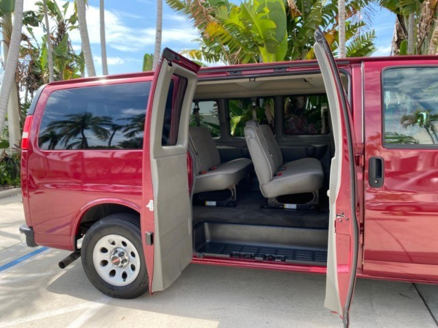 2009 Sport Red Metallic /Medium Pewter GMC Savana Passenger LOW MILES 53,014 1 OWNER 8 Passenger (1GKFG154891) with an 5.3L Vortec 1000 V8 SFI Engine engine, Automatic transmission, located at 4701 North Dixie Hwy, Pompano Beach, FL, 33064, (954) 422-2889, 26.240938, -80.123474 - OUR WEBPAGE FLORIDACARS1.COM HAS OVER 100 PHOTOS AND FREE CARFAX LINK 2009 GMC Savana LS 1500 1 OWNER 8 PASSENGER Van 5.3L V8 F OHV 16V Flex Fuel 16 MPG Rear Wheel Drive Features ABS Brakes Air Conditioning AM/FM Stereo Automatic Transmission CD Audio Cloth Seats Cruise Control Overhead Airbags Powe- Photo#14