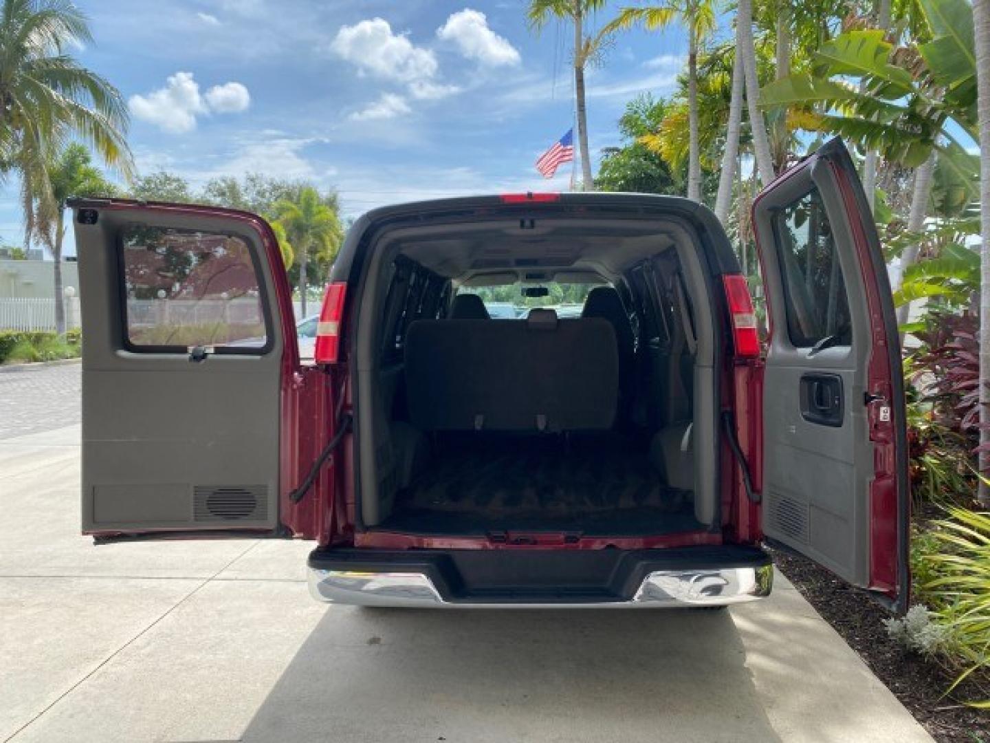 2009 Sport Red Metallic /Medium Pewter GMC Savana Passenger LOW MILES 53,014 1 OWNER 8 Passenger (1GKFG154891) with an 5.3L Vortec 1000 V8 SFI Engine engine, Automatic transmission, located at 4701 North Dixie Hwy, Pompano Beach, FL, 33064, (954) 422-2889, 26.240938, -80.123474 - OUR WEBPAGE FLORIDACARS1.COM HAS OVER 100 PHOTOS AND FREE CARFAX LINK 2009 GMC Savana LS 1500 1 OWNER 8 PASSENGER Van 5.3L V8 F OHV 16V Flex Fuel 16 MPG Rear Wheel Drive Features ABS Brakes Air Conditioning AM/FM Stereo Automatic Transmission CD Audio Cloth Seats Cruise Control Overhead Airbags Powe- Photo#15