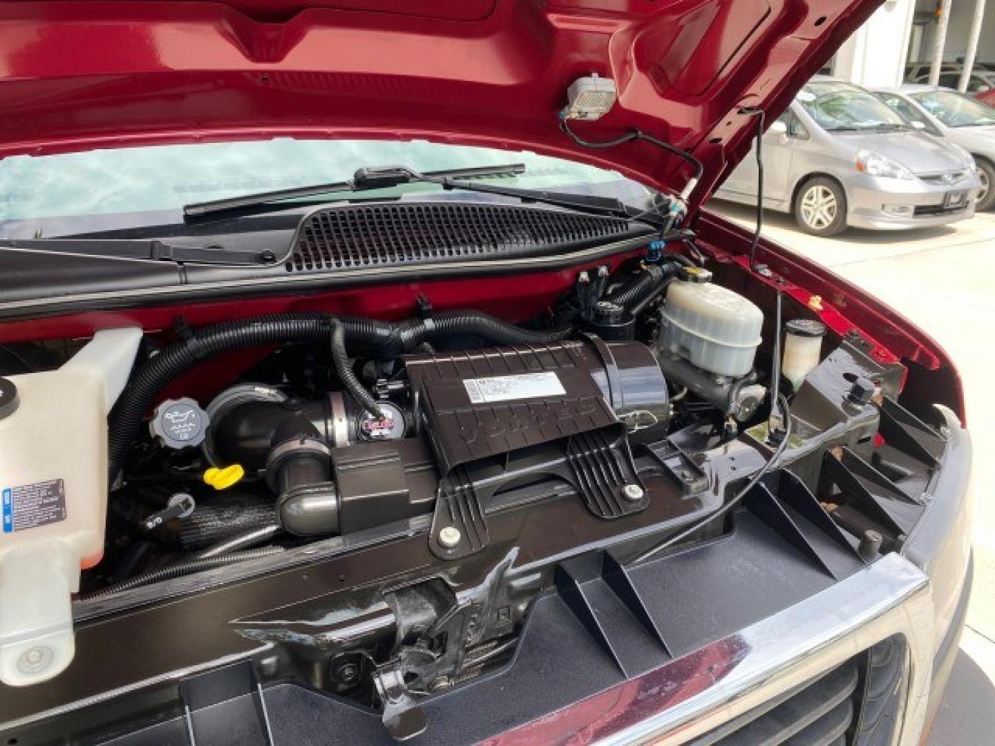 2009 Sport Red Metallic /Medium Pewter GMC Savana Passenger LOW MILES 53,014 1 OWNER 8 Passenger (1GKFG154891) with an 5.3L Vortec 1000 V8 SFI Engine engine, Automatic transmission, located at 4701 North Dixie Hwy, Pompano Beach, FL, 33064, (954) 422-2889, 26.240938, -80.123474 - OUR WEBPAGE FLORIDACARS1.COM HAS OVER 100 PHOTOS AND FREE CARFAX LINK 2009 GMC Savana LS 1500 1 OWNER 8 PASSENGER Van 5.3L V8 F OHV 16V Flex Fuel 16 MPG Rear Wheel Drive Features ABS Brakes Air Conditioning AM/FM Stereo Automatic Transmission CD Audio Cloth Seats Cruise Control Overhead Airbags Powe- Photo#25