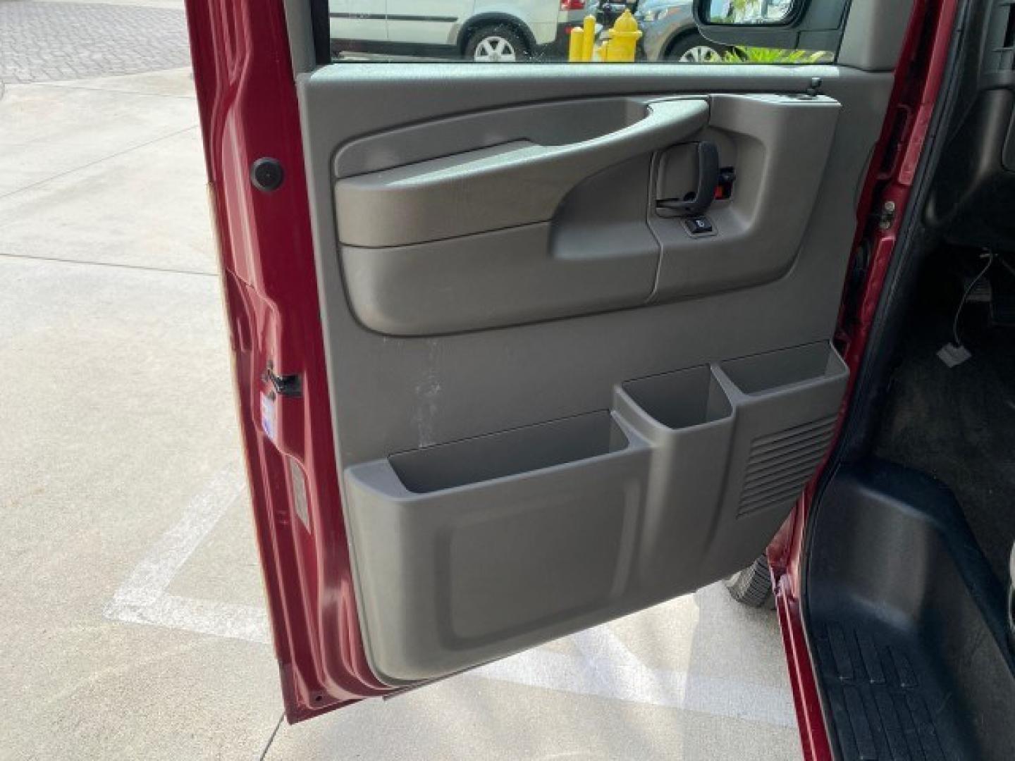 2009 Sport Red Metallic /Medium Pewter GMC Savana Passenger LOW MILES 53,014 1 OWNER 8 Passenger (1GKFG154891) with an 5.3L Vortec 1000 V8 SFI Engine engine, Automatic transmission, located at 4701 North Dixie Hwy, Pompano Beach, FL, 33064, (954) 422-2889, 26.240938, -80.123474 - OUR WEBPAGE FLORIDACARS1.COM HAS OVER 100 PHOTOS AND FREE CARFAX LINK 2009 GMC Savana LS 1500 1 OWNER 8 PASSENGER Van 5.3L V8 F OHV 16V Flex Fuel 16 MPG Rear Wheel Drive Features ABS Brakes Air Conditioning AM/FM Stereo Automatic Transmission CD Audio Cloth Seats Cruise Control Overhead Airbags Powe- Photo#39