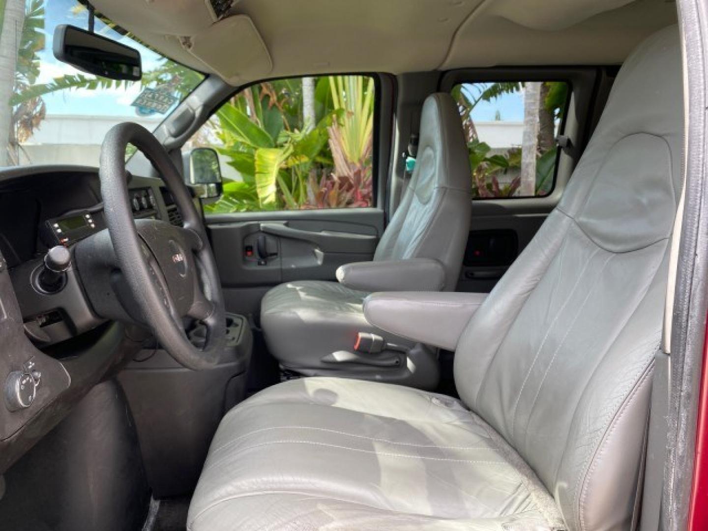 2009 Sport Red Metallic /Medium Pewter GMC Savana Passenger LOW MILES 53,014 1 OWNER 8 Passenger (1GKFG154891) with an 5.3L Vortec 1000 V8 SFI Engine engine, Automatic transmission, located at 4701 North Dixie Hwy, Pompano Beach, FL, 33064, (954) 422-2889, 26.240938, -80.123474 - OUR WEBPAGE FLORIDACARS1.COM HAS OVER 100 PHOTOS AND FREE CARFAX LINK 2009 GMC Savana LS 1500 1 OWNER 8 PASSENGER Van 5.3L V8 F OHV 16V Flex Fuel 16 MPG Rear Wheel Drive Features ABS Brakes Air Conditioning AM/FM Stereo Automatic Transmission CD Audio Cloth Seats Cruise Control Overhead Airbags Powe- Photo#41